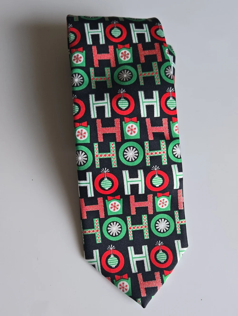 New Hallmark Black Necktie with Red and Green Holiday 'HO HO HO'